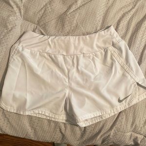 White Nike shorts